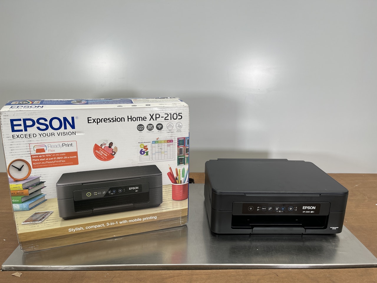1 imprimante epson xp-2105 Produit non testés Vendu en l’état sans garantie